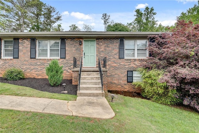 2653 Elkhart Cir SW, Marietta, GA 30064 - view of front facade featuring a front lawn and brick siding