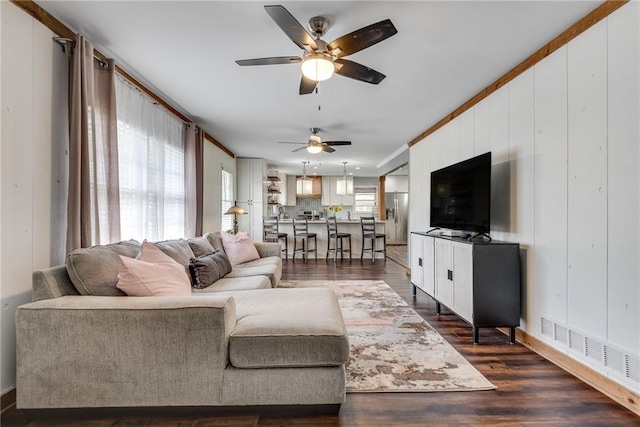 2653 Elkhart Cir SW, Marietta, GA 30064 - living room featuring ceiling fan, dark wood-style flooring, and crown molding