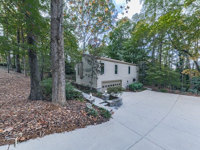 3771 Club Dr NW, Kennesaw, GA 30144 - view of front of property featuring a garage and driveway