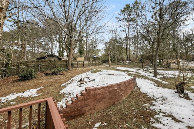 view of yard covered in snow