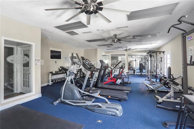 1303 Wingate Way, Atlanta, GA 30350 - workout area featuring ceiling fan, a textured ceiling, and baseboards