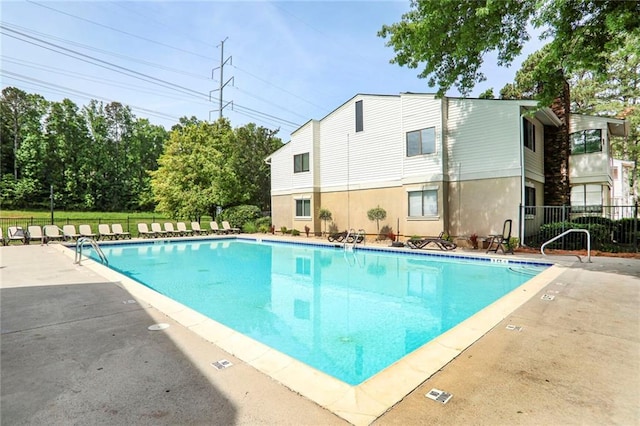 1303 Wingate Way, Atlanta, GA 30350 - community pool featuring a patio area
