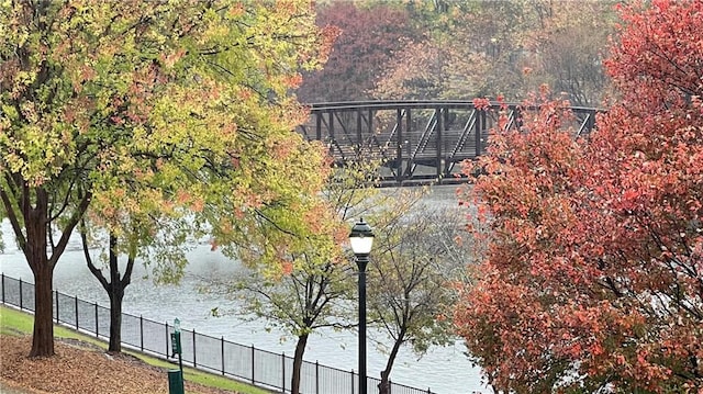 view of gate featuring a water view