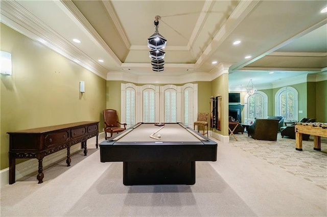 rec room with pool table, a tray ceiling, crown molding, and carpet flooring