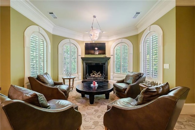 living area featuring crown molding