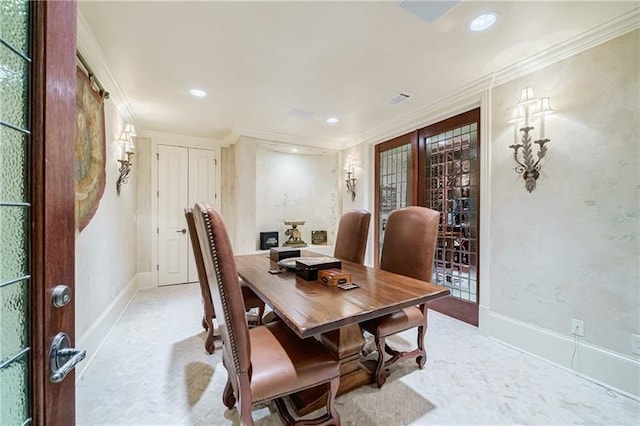 dining area featuring ornamental molding