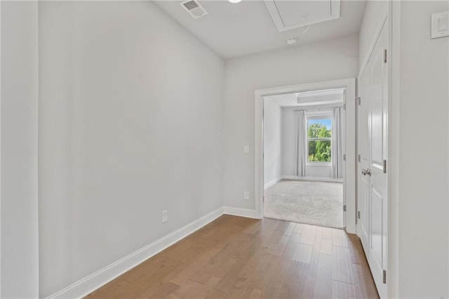 1858 Glenview Park Cir, Duluth, GA 30097 - corridor with attic access and wood finished floors