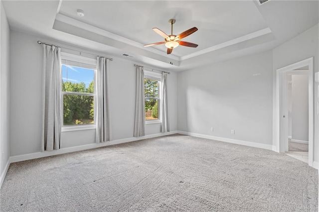1858 Glenview Park Cir, Duluth, GA 30097 - carpeted spare room featuring a raised ceiling, ceiling fan, and a smoke detector