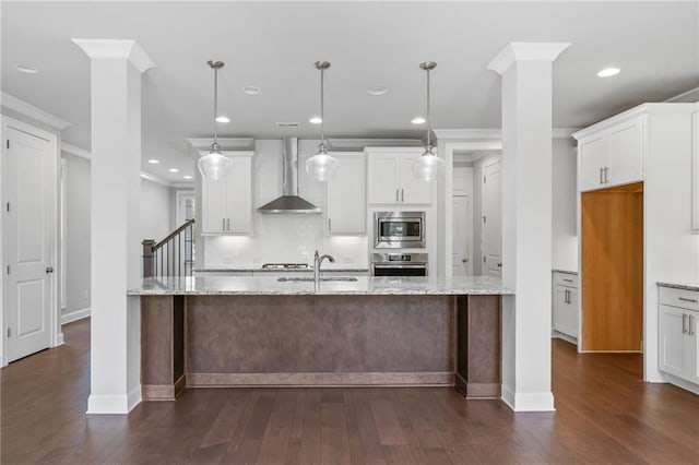 1858 Glenview Park Cir, Duluth, GA 30097 - kitchen featuring stainless steel appliances, wall chimney exhaust hood, decorative backsplash, white cabinetry, and dark wood-style floors