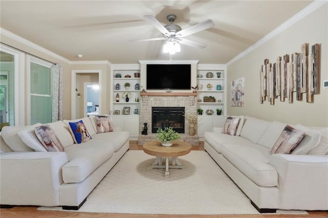 4383 Capstone Ct NE, Roswell, GA 30075 - living room featuring a ceiling fan, a fireplace, crown molding, and built in features
