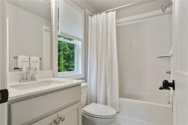 full bath featuring toilet, shower / bath combination with curtain, and vanity