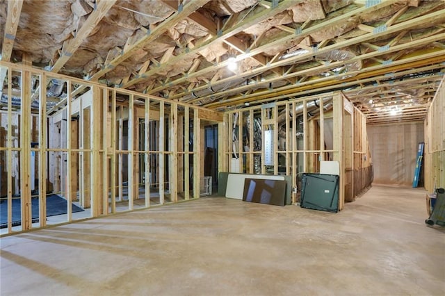 misc room with concrete flooring
