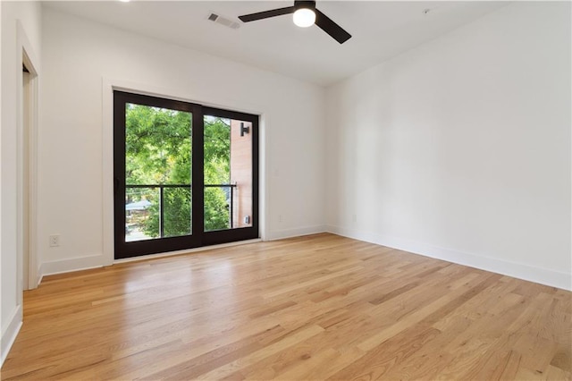 367 Parkway Dr NE Unit 9, Atlanta, GA 30312 - spare room featuring light wood finished floors, baseboards, and a ceiling fan