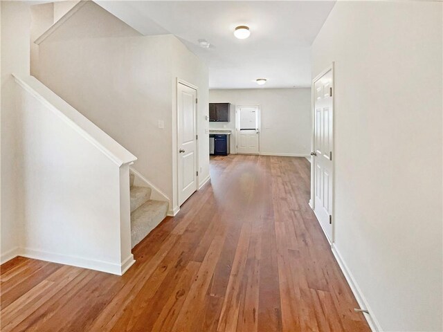 corridor featuring hardwood / wood-style flooring