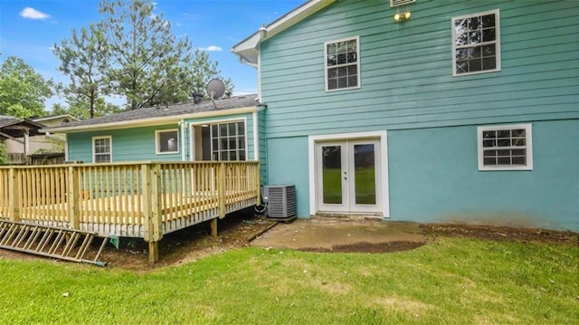 1328 Hoy Taylor Dr, Norcross, GA 30093 - back of property featuring central air condition unit, a wooden deck, a yard, french doors, and stucco siding