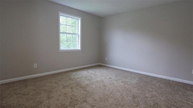 1328 Hoy Taylor Dr, Norcross, GA 30093 - unfurnished room featuring carpet flooring and baseboards