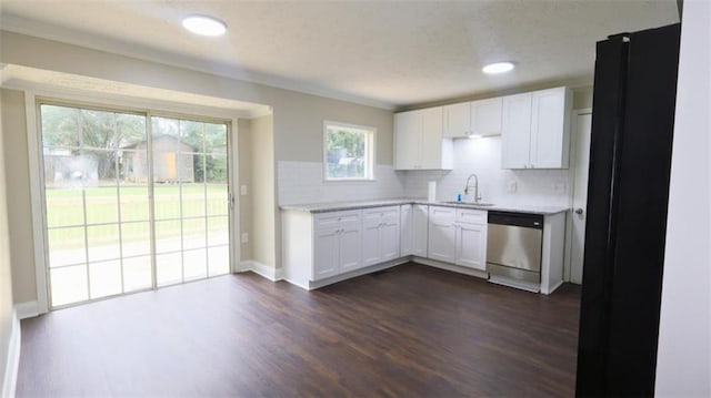 1328 Hoy Taylor Dr, Norcross, GA 30093 - kitchen featuring dishwasher, backsplash, dark wood-type flooring, light countertops, and white cabinetry