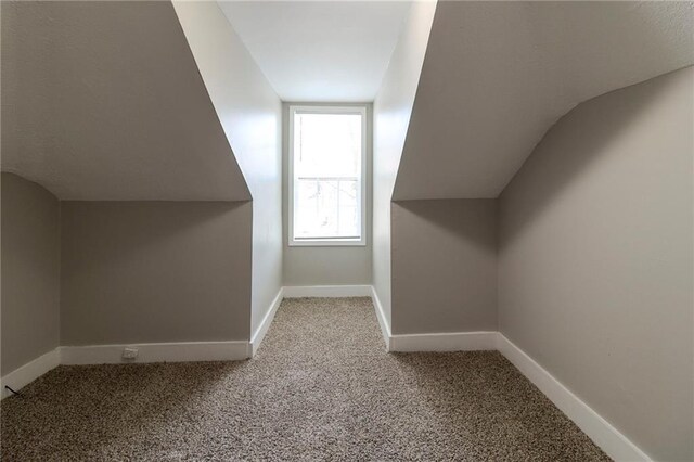 1124 Lawton Pl SW, Atlanta, GA 30310 - bonus room with baseboards, vaulted ceiling, and carpet floors
