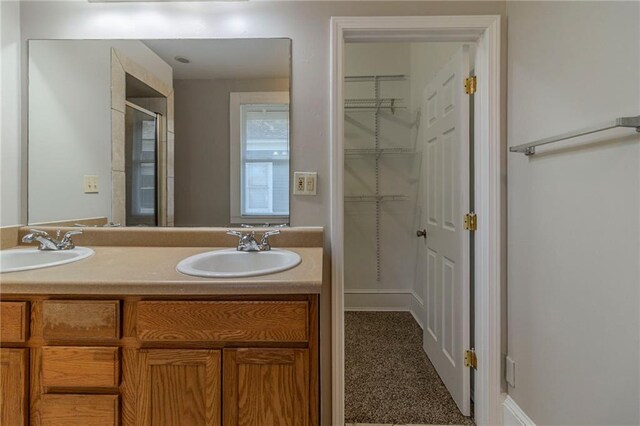 1124 Lawton Pl SW, Atlanta, GA 30310 - bathroom with double vanity, a sink, and an enclosed shower