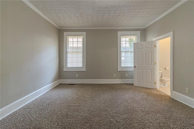 1124 Lawton Pl SW, Atlanta, GA 30310 - spare room featuring plenty of natural light, baseboards, ornamental molding, and carpet flooring