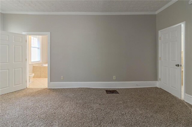 1124 Lawton Pl SW, Atlanta, GA 30310 - unfurnished room featuring crown molding, carpet flooring, a textured ceiling, baseboards, and visible vents
