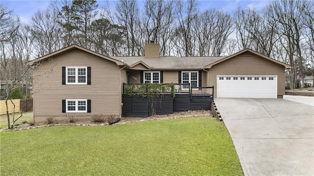 ranch-style home featuring concrete driveway, a front yard, a shingled roof, a garage, and a chimney