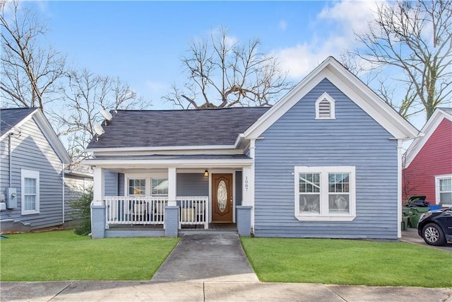 bungalow-style house featuring a front yard and a porch