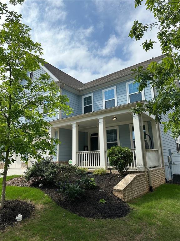 view of front of property featuring covered porch