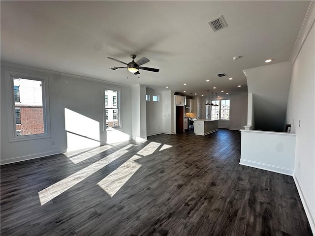508 Healy Dr Unit 70, Cumming, GA 30040 - unfurnished living room with ceiling fan, baseboards, dark wood finished floors, and recessed lighting