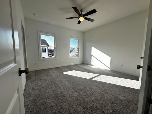 508 Healy Dr Unit 70, Cumming, GA 30040 - carpeted empty room with baseboards and a ceiling fan