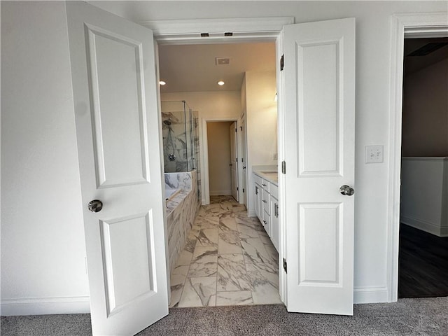 508 Healy Dr Unit 70, Cumming, GA 30040 - full bathroom featuring a shower with door, a tub to relax in, marble finish flooring, recessed lighting, and baseboards