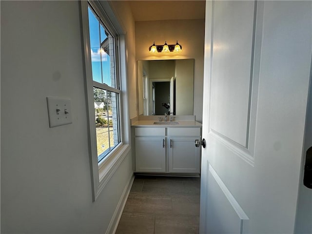 508 Healy Dr Unit 70, Cumming, GA 30040 - bathroom with vanity and baseboards