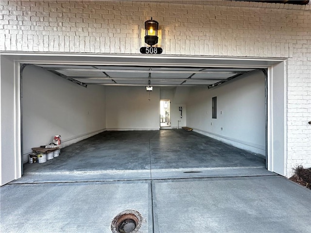 508 Healy Dr Unit 70, Cumming, GA 30040 - garage with electric panel and baseboards