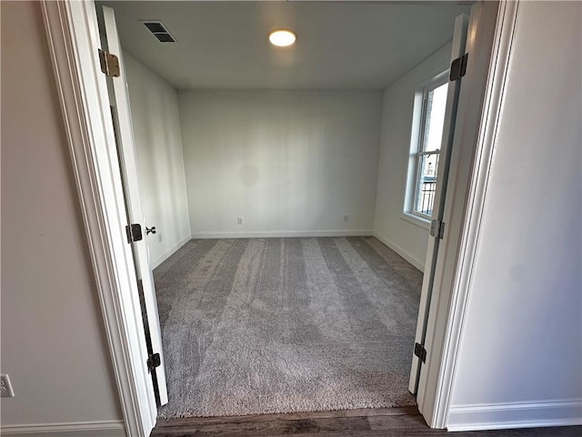 508 Healy Dr Unit 70, Cumming, GA 30040 - empty room featuring baseboards and carpet flooring