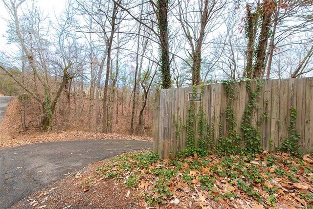 view of gate featuring fence