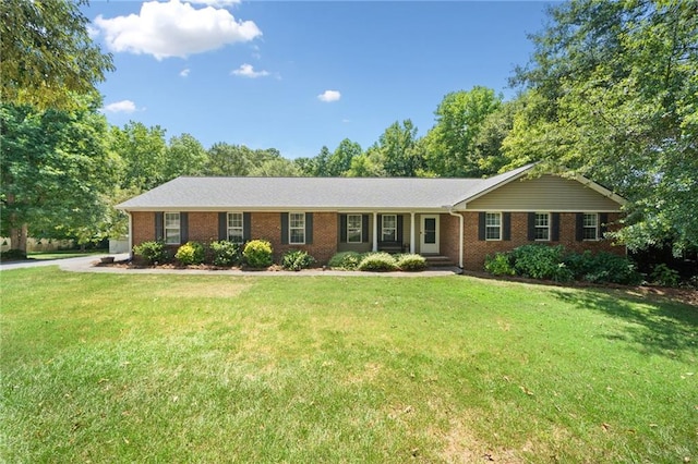 ranch-style house with a front lawn