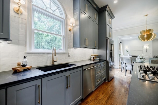 663 Clifton Rd NE, Atlanta, GA 30307 - kitchen with a sink, stainless steel appliances, dark countertops, dark wood-type flooring, and gray cabinets