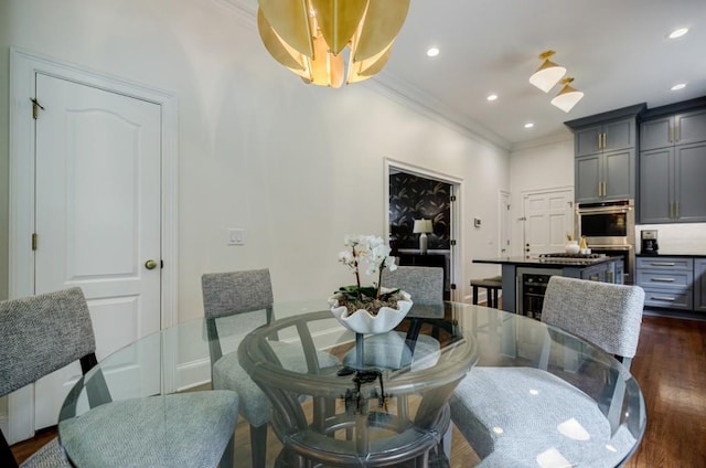663 Clifton Rd NE, Atlanta, GA 30307 - dining space with crown molding, dark wood-style floors, and recessed lighting