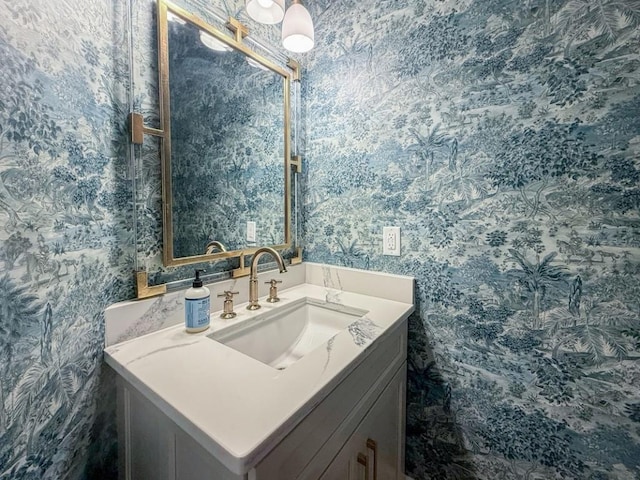 663 Clifton Rd NE, Atlanta, GA 30307 - bathroom featuring wallpapered walls and vanity