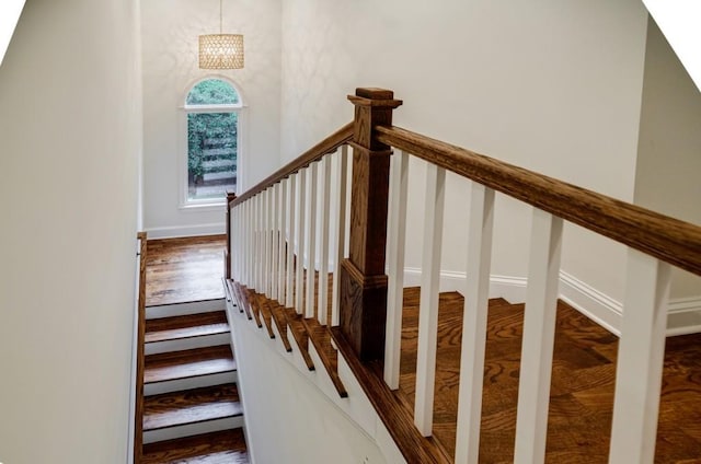 663 Clifton Rd NE, Atlanta, GA 30307 - stairway featuring a chandelier and wood finished floors