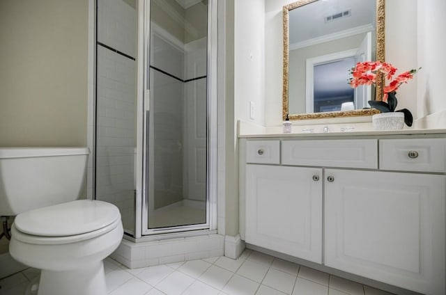 663 Clifton Rd NE, Atlanta, GA 30307 - bathroom with ornamental molding, toilet, vanity, a stall shower, and tile patterned floors