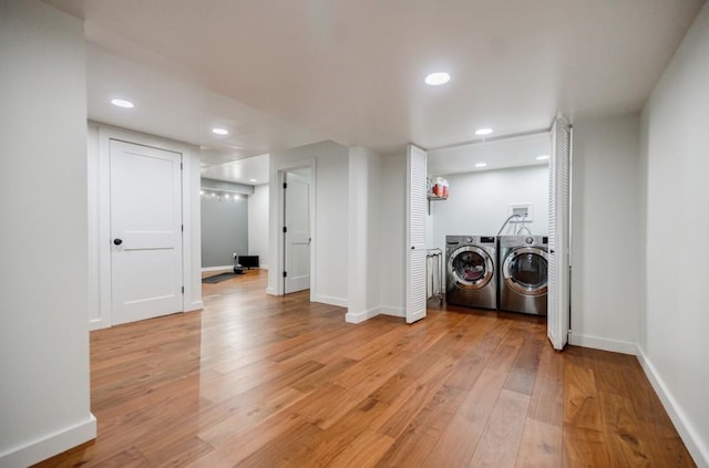 663 Clifton Rd NE, Atlanta, GA 30307 - laundry room featuring washing machine and dryer, light wood-style floors, baseboards, and recessed lighting