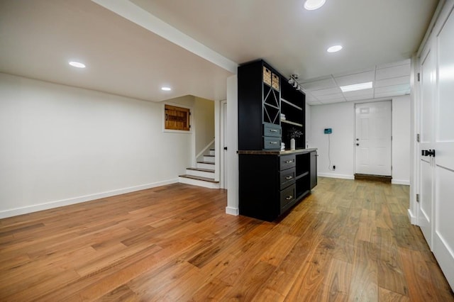 663 Clifton Rd NE, Atlanta, GA 30307 - kitchen with dark cabinets, light wood-style flooring, baseboards, recessed lighting, and open shelves