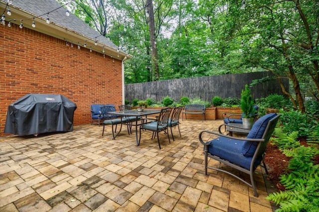 663 Clifton Rd NE, Atlanta, GA 30307 - view of patio / terrace featuring grilling area and outdoor dining space
