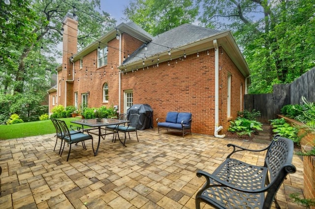 663 Clifton Rd NE, Atlanta, GA 30307 - view of patio with a grill and outdoor dining area