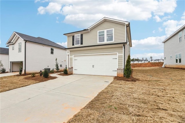 view of front of house with a garage, central AC, and a front yard