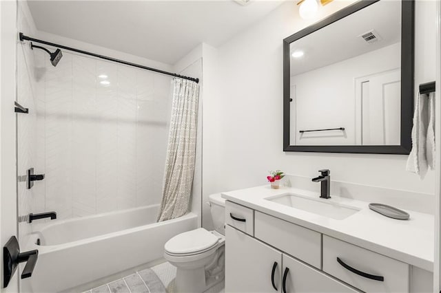 full bathroom featuring tile patterned flooring, shower / bath combo, toilet, and vanity