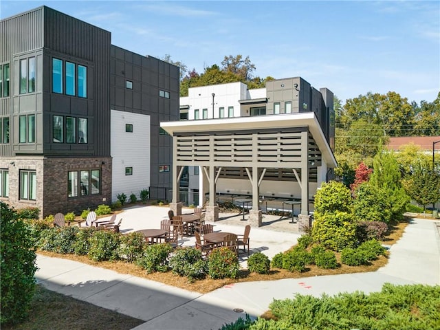 view of property's community featuring a patio