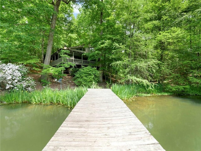 view of dock with a water view