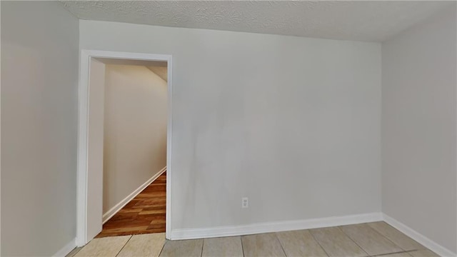 145 Charleston Pl, Covington, GA 30016 - unfurnished room with baseboards and light wood finished floors
